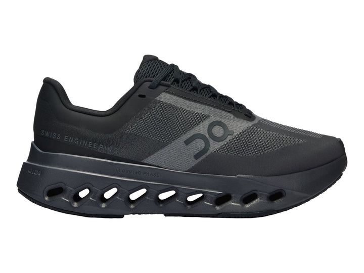 Tenis deportivos On Cloud color negro con suela de celdas huecas y diseño moderno.