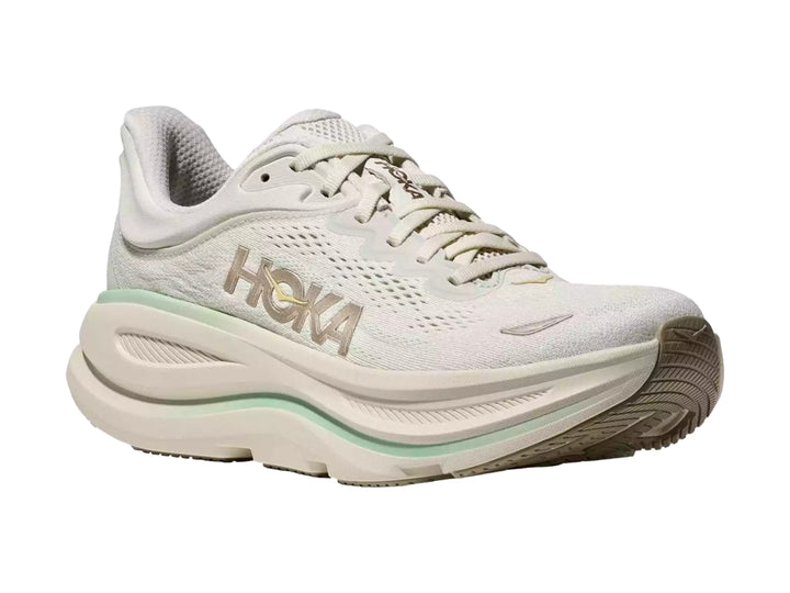 Tenis HOKA Bondi 9 color blanco crema con detalles en verde menta y suela amortiguada