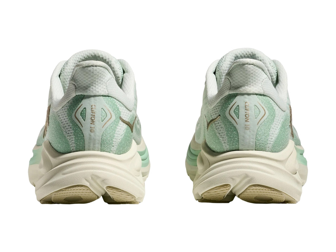 Tenis deportivos HOKA Clifton 10 en color verde menta y blanco con suela ancha amortiguada.