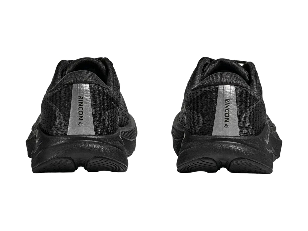 Tenis deportivos HOKA Rincon 4 para Niño en color negro con suela gruesa y malla transpirable.