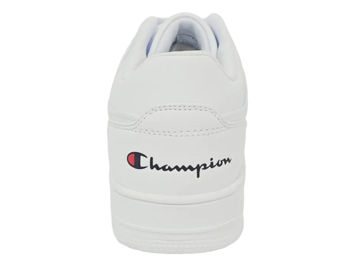 Tenis deportivos Champion de color blanco con logotipo lateral en rojo y azul, diseño casual y suela plana.