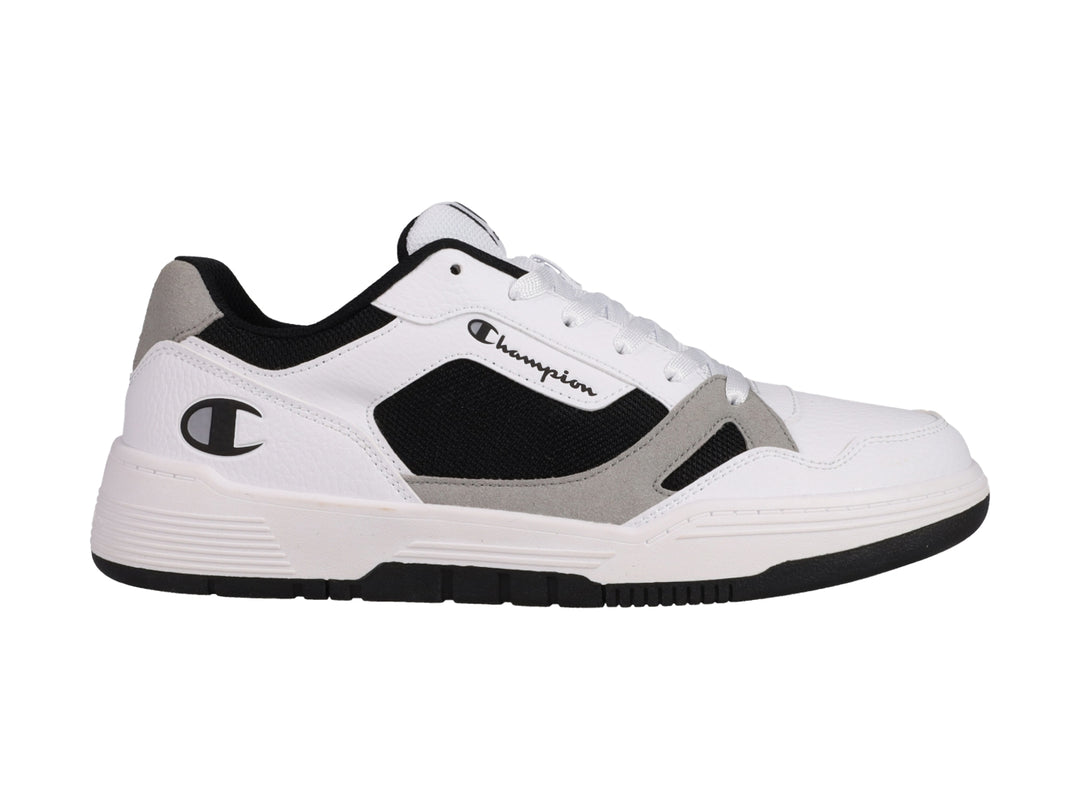 Tenis Champion Heritage Lore Skate color blanco con detalles en negro y gris.