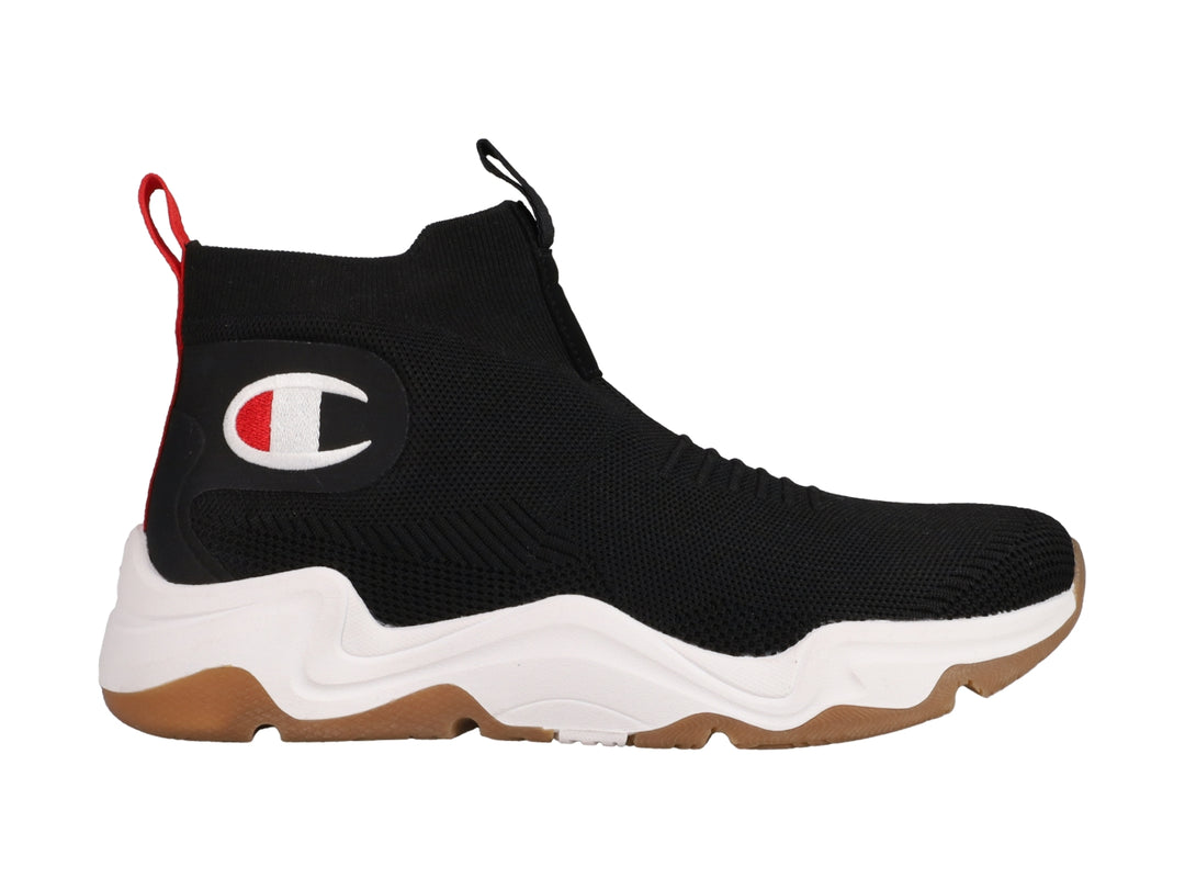 Tenis Champion color negro con suela blanca y marrón, diseño tipo calcetín y logo lateral