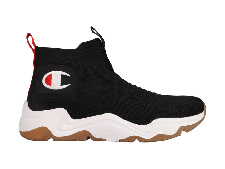 Tenis Champion color negro con suela blanca y marrón, diseño tipo calcetín y logo lateral