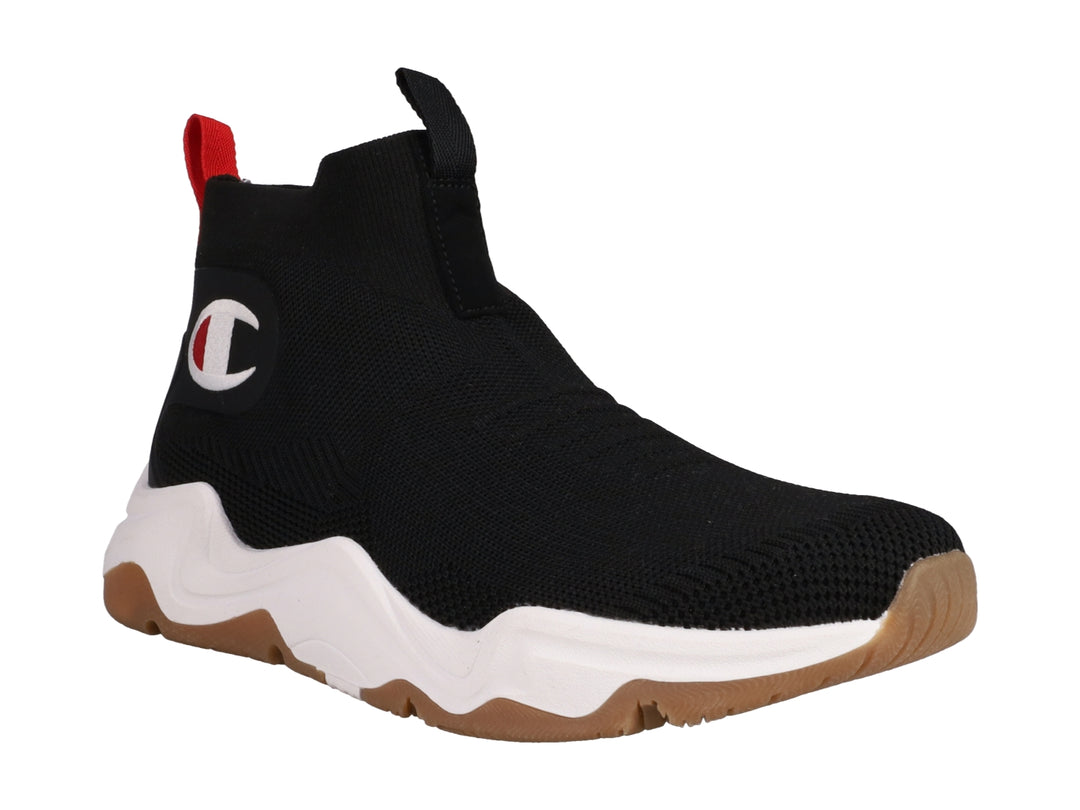 Tenis Champion color negro con suela blanca y marrón, diseño tipo calcetín y logo lateral