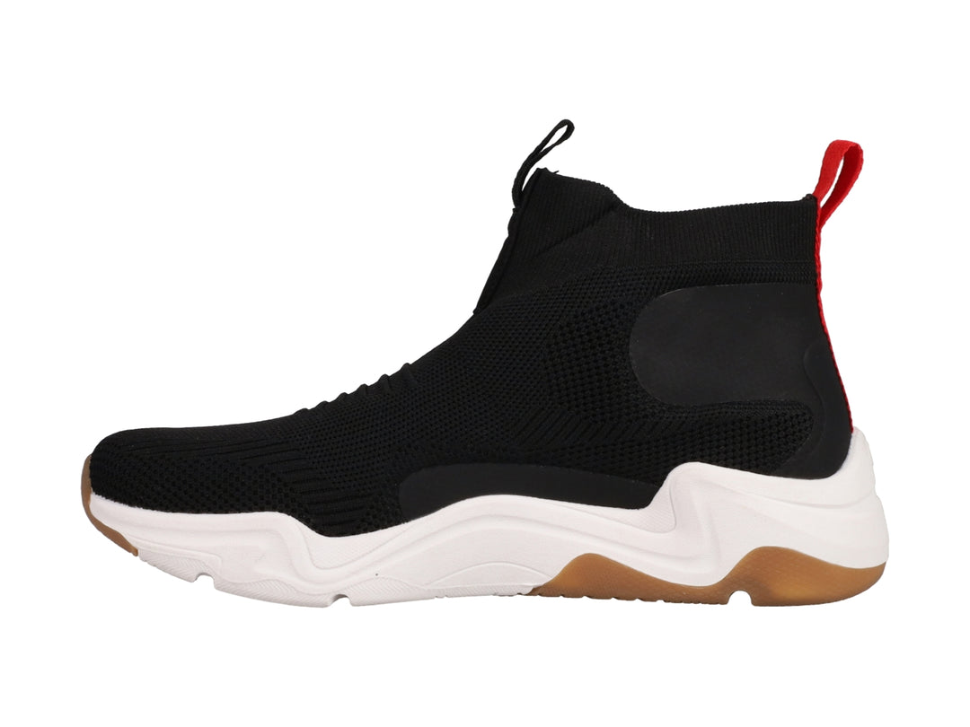 Tenis Champion color negro con suela blanca y marrón, diseño tipo calcetín y logo lateral