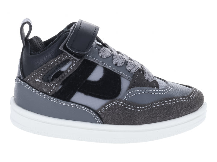 Tenis infantiles Panam color negro oxford con suela blanca y ajuste de velcro.
