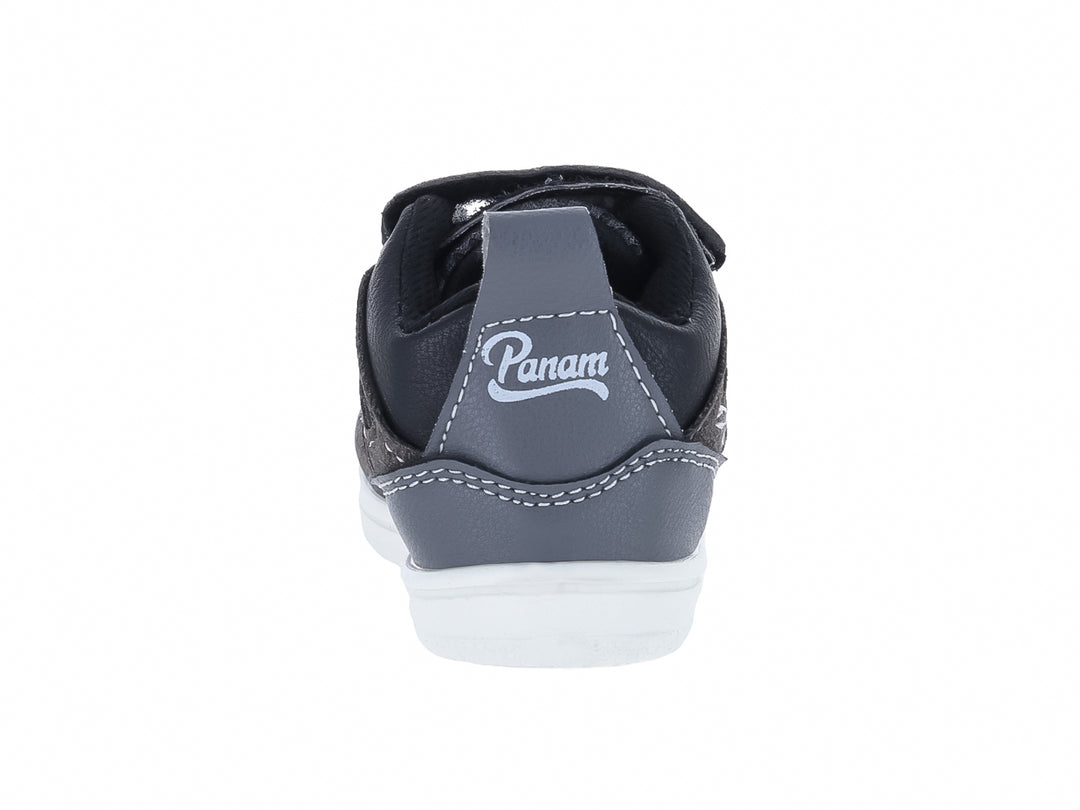Tenis infantiles Panam color negro oxford con suela blanca y ajuste de velcro.