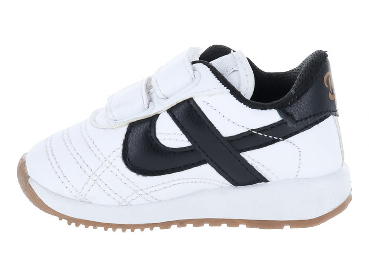 Tenis infantiles Panam blancos con detalles en negro y suela de goma, cierre con velcro.