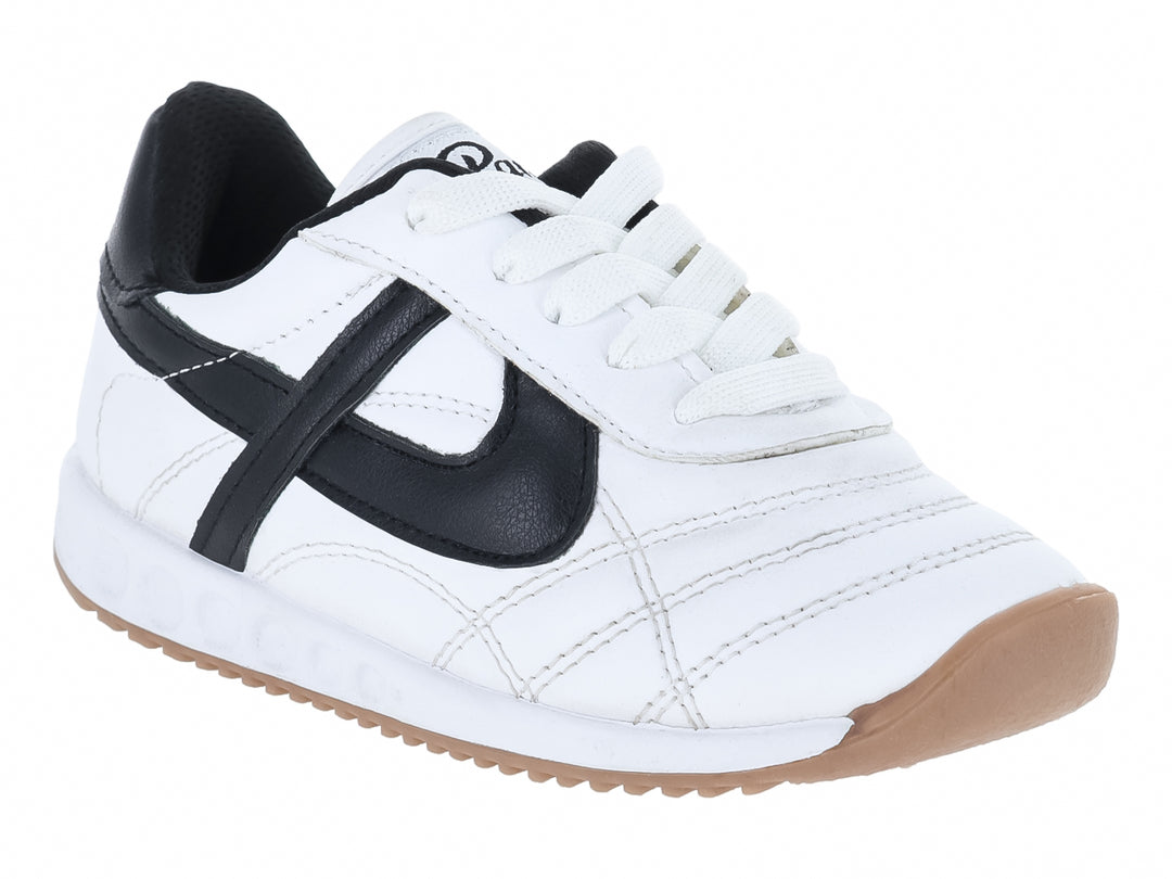Tenis Panam blancos con detalles en negro y suela color café para niños.