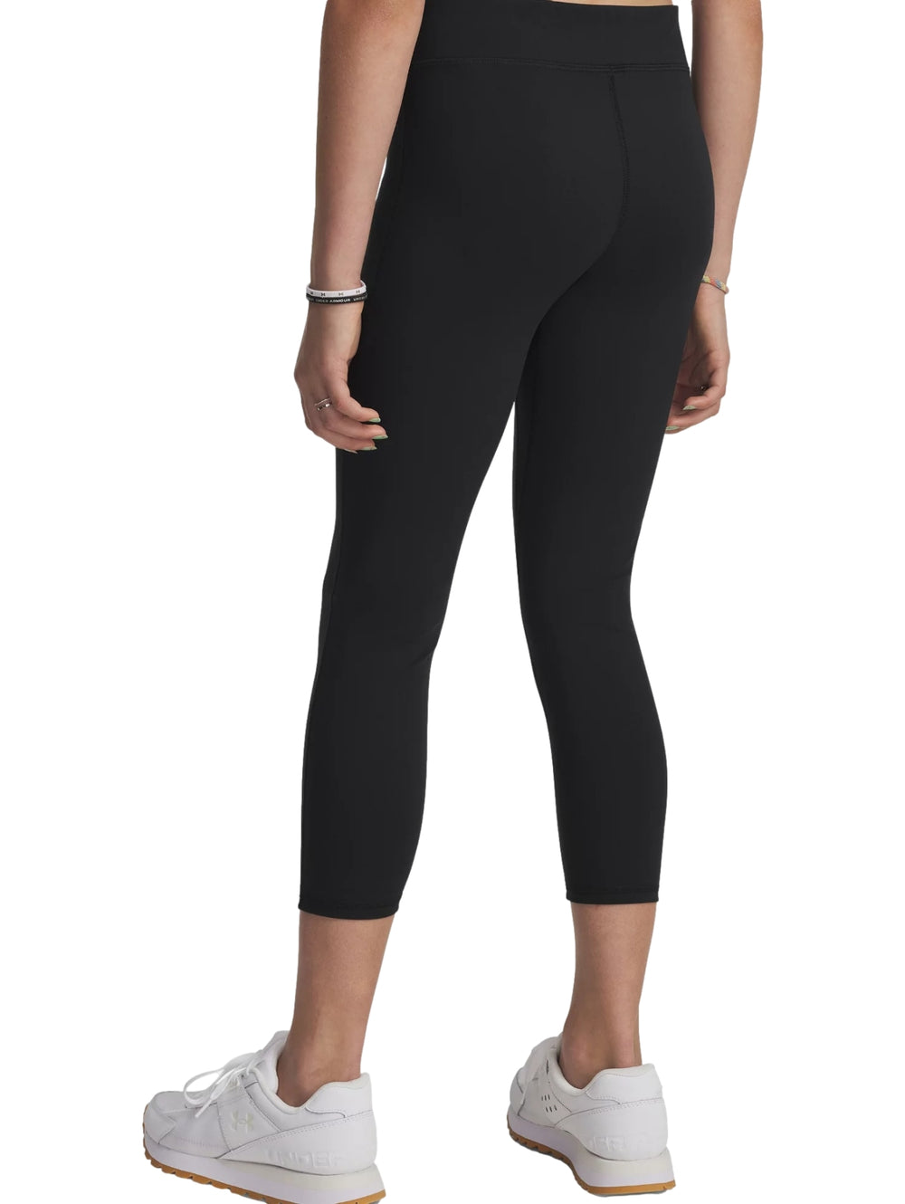 Leggings deportivos negros Under Armour de corte al tobillo y ajuste ceñido.