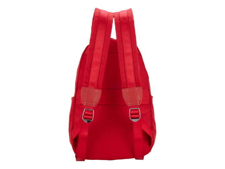 Mochila Cloe de color rojo con diseño liso, asa superior y un bolsillo frontal amplio.