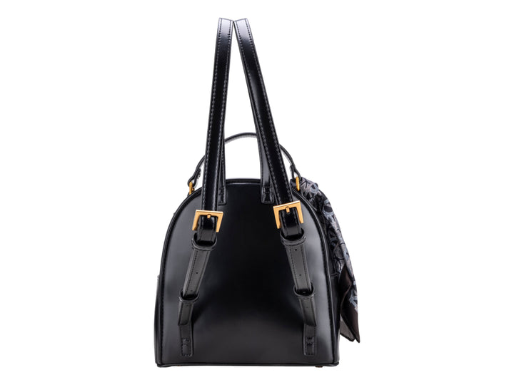 Mochila negra Cloe con herraje dorado y un pañuelo decorativo gris atado al asa superior.