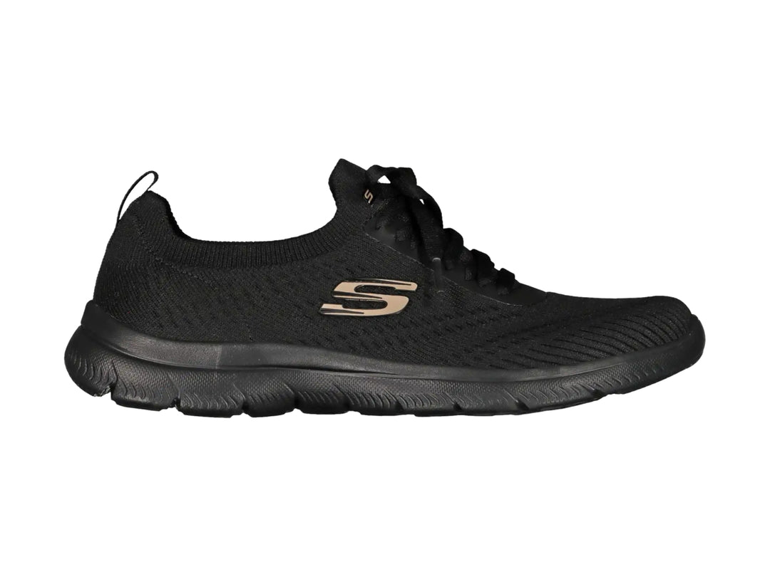 Tenis deportivos Skechers para mujer en color negro con detalles dorados y suela flexible.