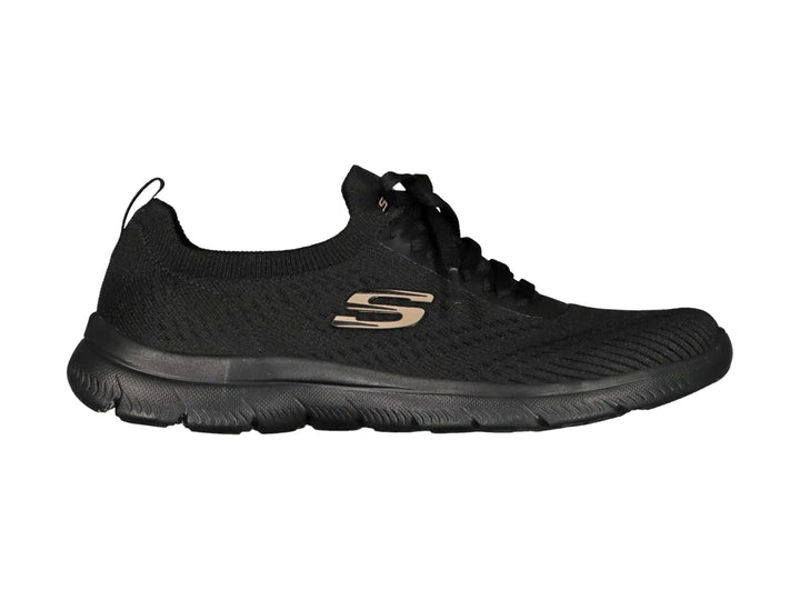 Tenis deportivos Skechers para mujer en color negro con detalles dorados y suela flexible.