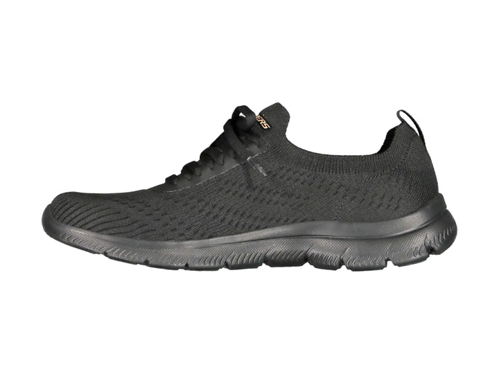 Tenis deportivos Skechers para mujer en color negro con detalles dorados y suela flexible.