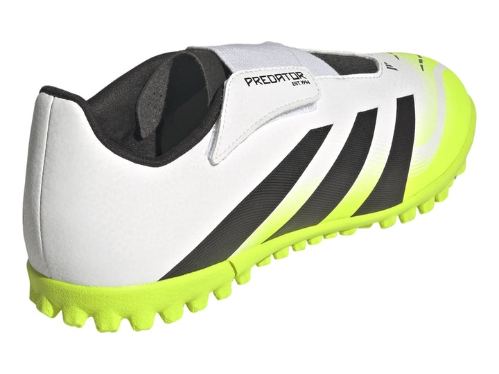 Zapato de fútbol Adidas Predator color blanco con rayas negras y suela amarillo neón.