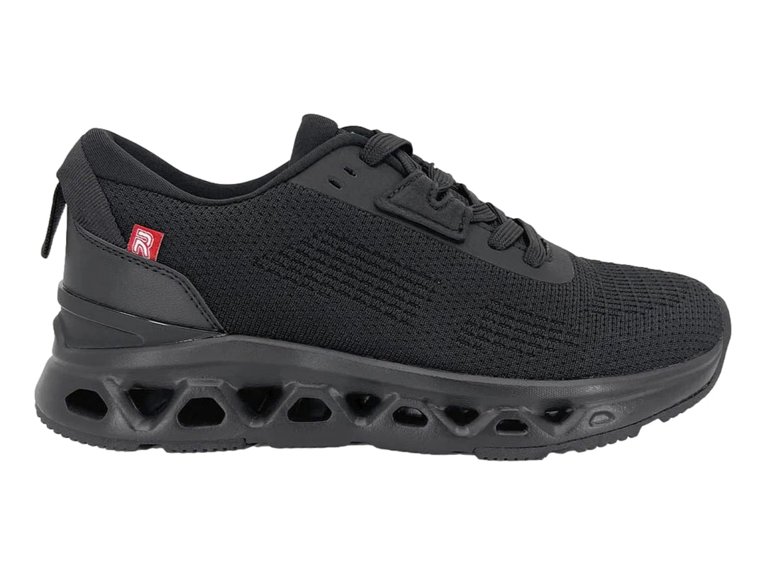 Tenis deportivos Rebounce color negro con suela gruesa perforada y parte superior de malla textil.