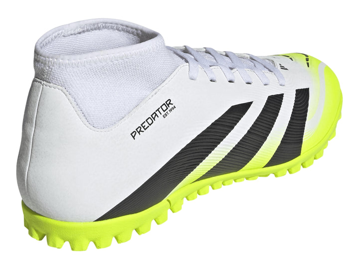Zapato de fútbol Adidas Predator en color blanco con rayas negras y suela amarilla brillante.