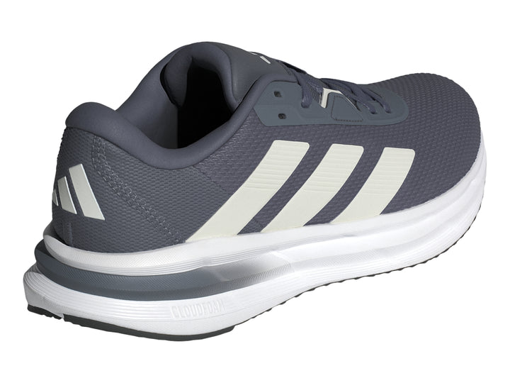 Tenis deportivos Adidas Galaxy 7 color gris con tres franjas blancas y suela blanca.