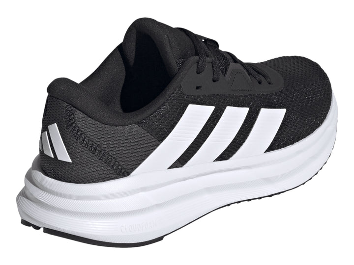 Tenis deportivos Adidas Galaxy 7 color negro con tres franjas y suela blanca.
