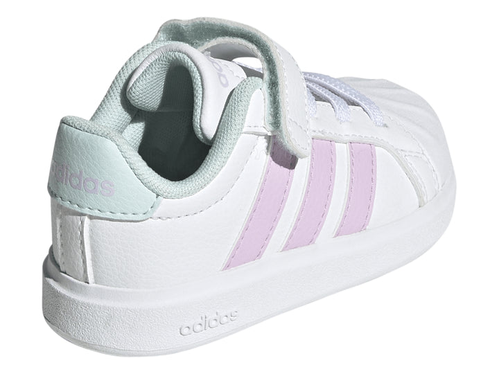Tenis Adidas blancos con franjas lila y detalles en menta, con cierre de velcro y agujetas.