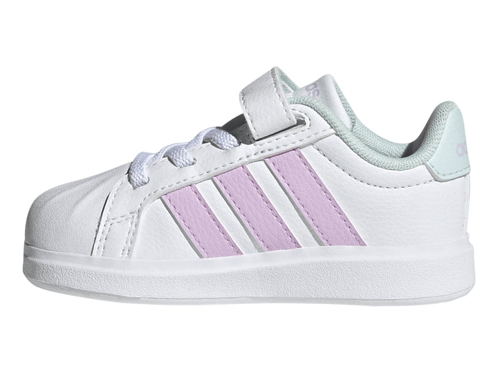 Tenis Adidas blancos con franjas lila y detalles en menta, con cierre de velcro y agujetas.