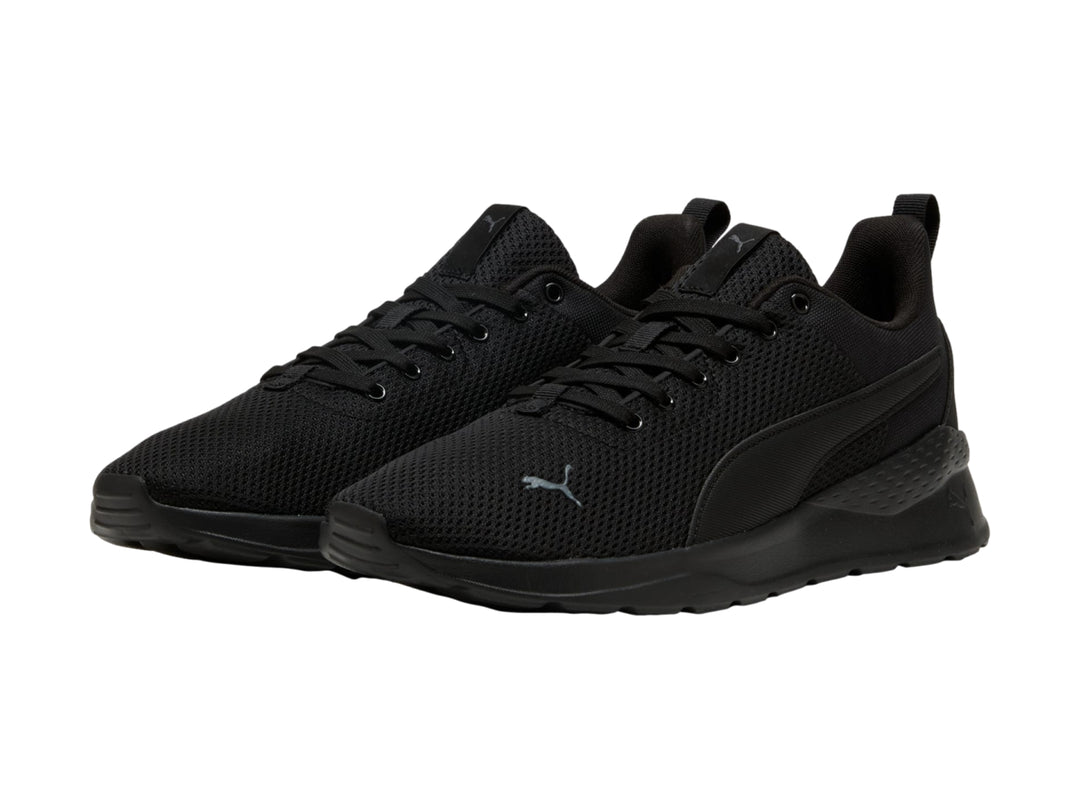 Tenis deportivos PUMA NZARUN LITE en color negro total, vista lateral.