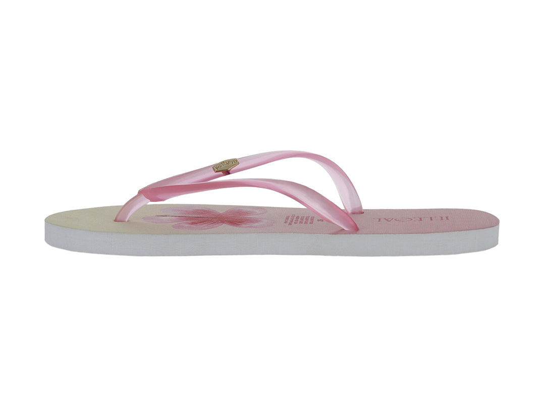 Sandalias de dedo color rosa con diseño floral en la plantilla y suela blanca.