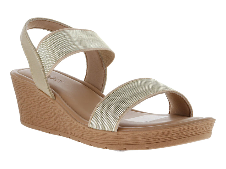 Sandalias de plataforma USAFLEX color dorado con suela color café.