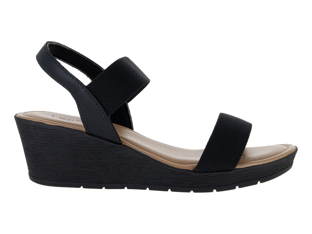Sandalia de plataforma color negro con plantillas beige para mujer.