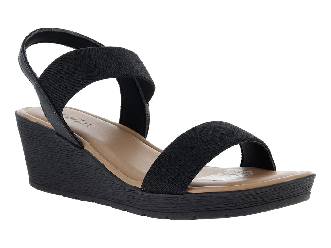 Sandalia de plataforma color negro con plantillas beige para mujer.