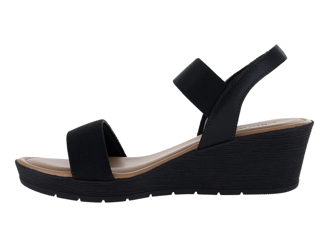 Sandalia de plataforma color negro con plantillas beige para mujer.