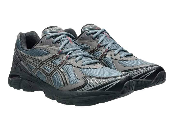 Tenis deportivos ASICS GT-2160 en color gris y azul con suela robusta y malla transpirable.