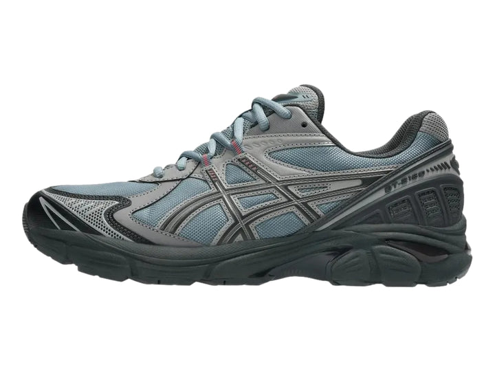 Tenis deportivos ASICS GT-2160 en color gris y azul con suela robusta y malla transpirable.