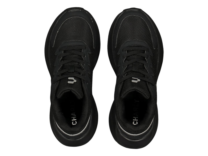 Tenis Charly color negro con detalles en gris, diseño deportivo y casual con suela robusta.