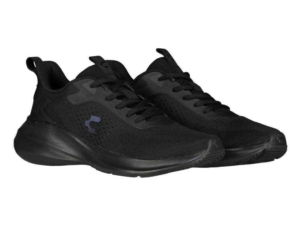 Tenis deportivos Charly color negro con tejido de malla y suela gruesa.