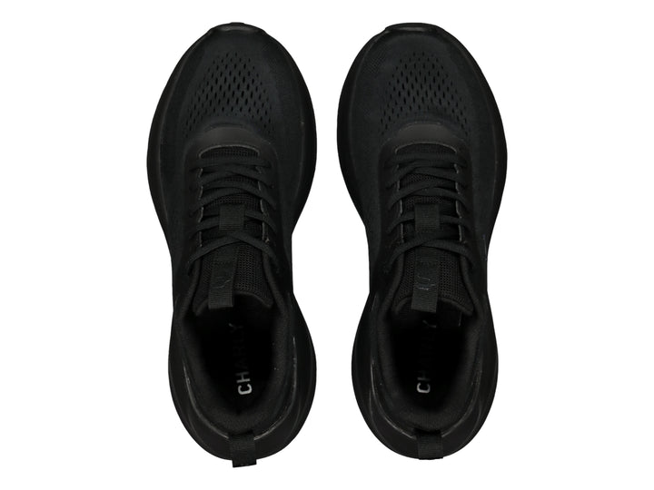 Tenis deportivos Charly color negro con tejido de malla y suela gruesa.