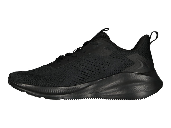 Tenis deportivos Charly color negro con tejido de malla y suela gruesa.