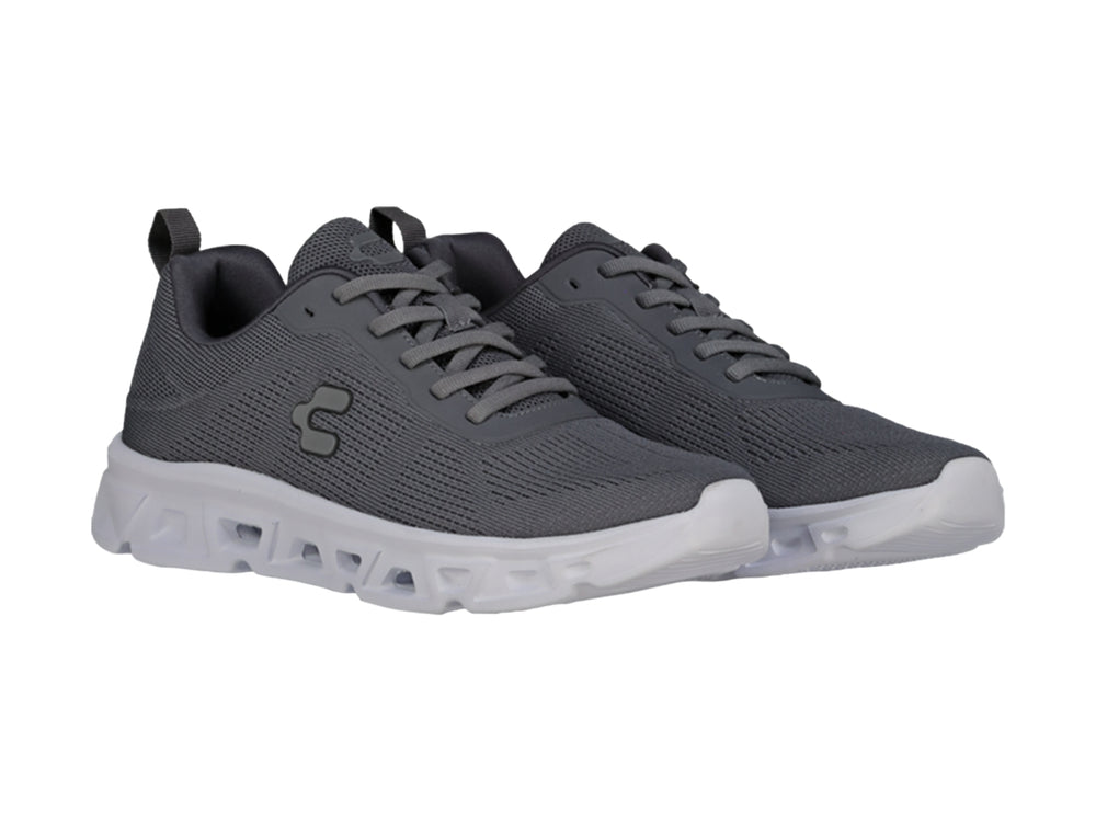Tenis deportivos Charly color gris Oxford con suela blanca y tejido de malla.