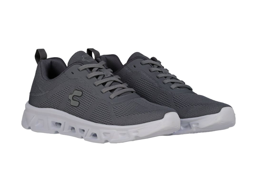 Tenis deportivos Charly color gris Oxford con suela blanca y tejido de malla.
