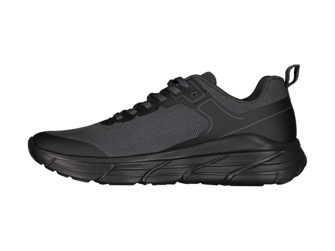 Tenis deportivos Charly en color negro y gris con suela robusta y agujetas negras.