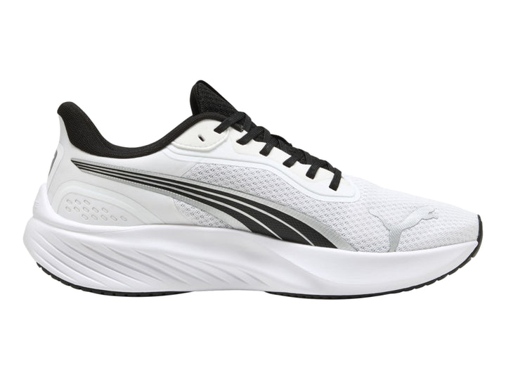 Tenis deportivos PUMA color blanco con detalles en negro y suela blanca.