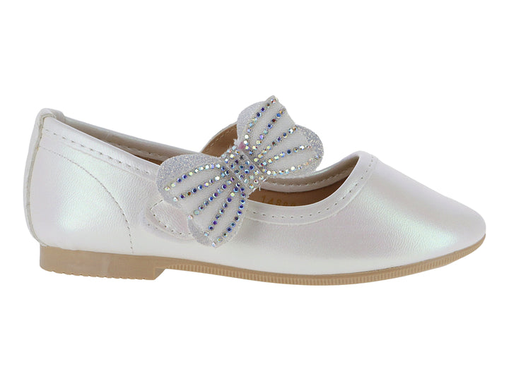 Zapato plano color blanco para niña con un moño decorativo con pedrería brillante en la parte superior.