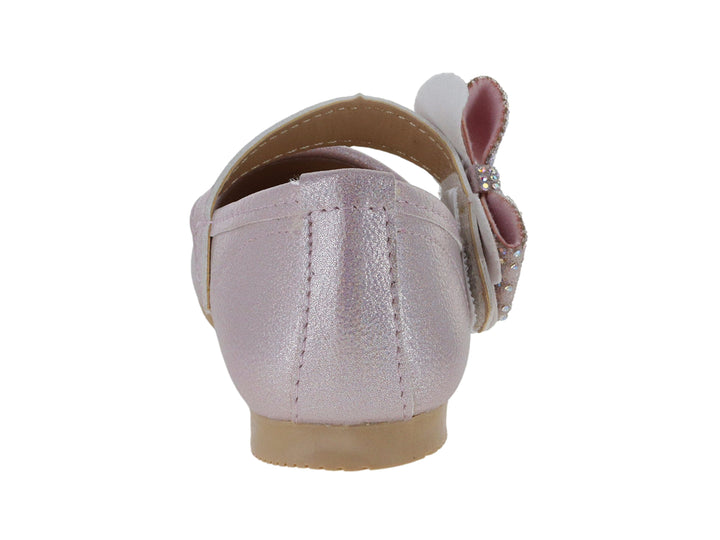Zapato plano para niña color rosa brillante con moño decorado con pedrería.