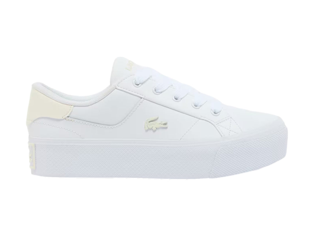 Tenis Lacoste blancos de plataforma con detalles en color crema y suela gruesa blanca.