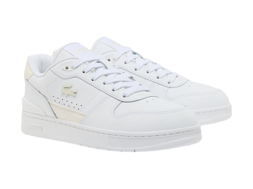 Tenis Lacoste T-Clip color blanco con detalles en beige y suela blanca.