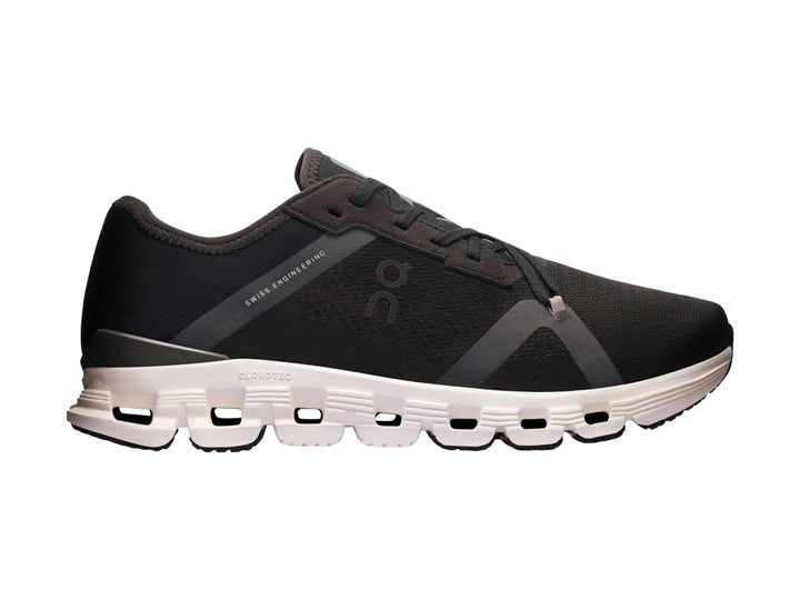 Tenis deportivos On Cloud color negro con suela blanca y diseño de amortiguación CloudTec.