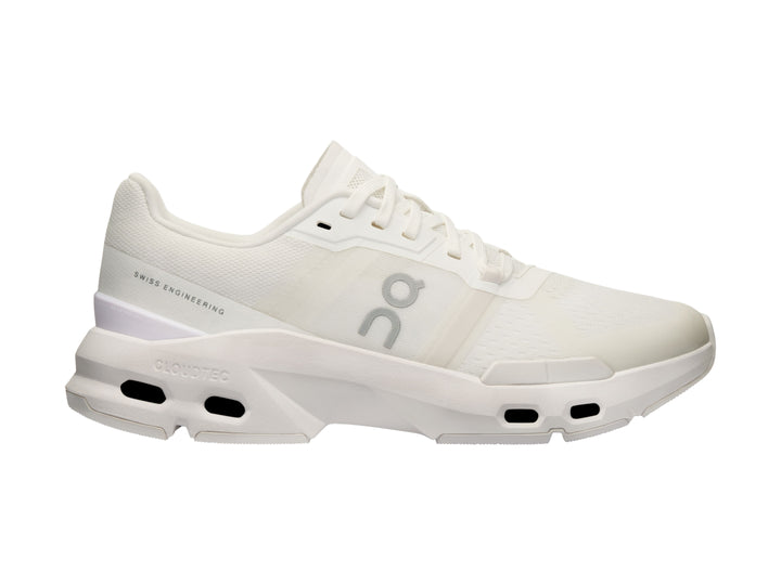 Tenis deportivos On Cloud en color blanco y gris claro con suela tecnológicay diseño moderno.