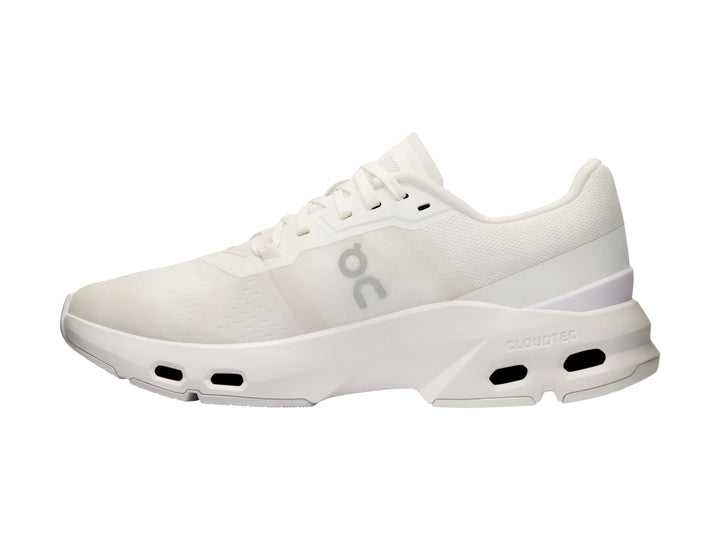 Tenis deportivos On Cloud en color blanco y gris claro con suela tecnológicay diseño moderno.